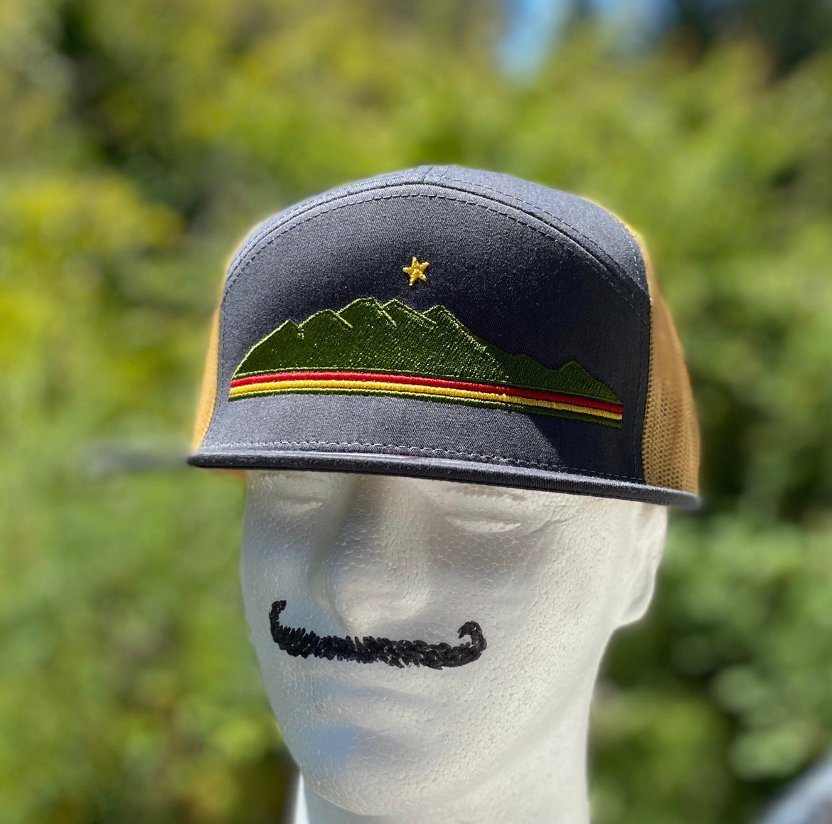 Richardson 168 7 Panel Trucker Cap with Rasta Logo- Charcoal/ Old Gold